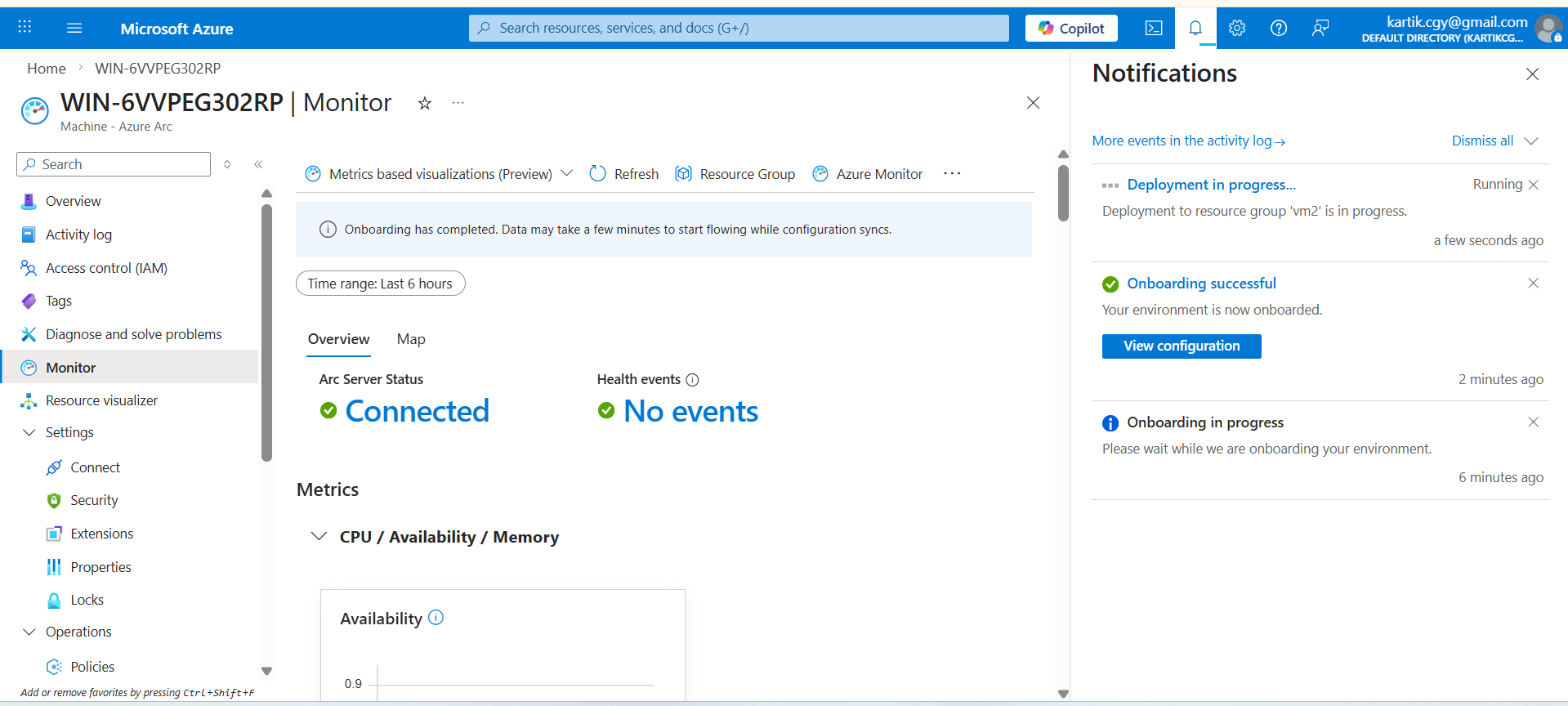 Azure Monitor overview for the Arc machine showing Connected status, no health events, and onboarding notifications confirming successful onboarding